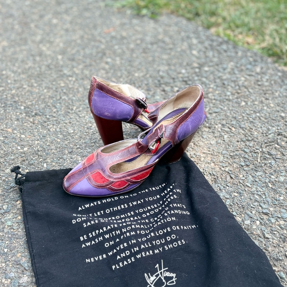Purple and red leather John Fluevog heels.